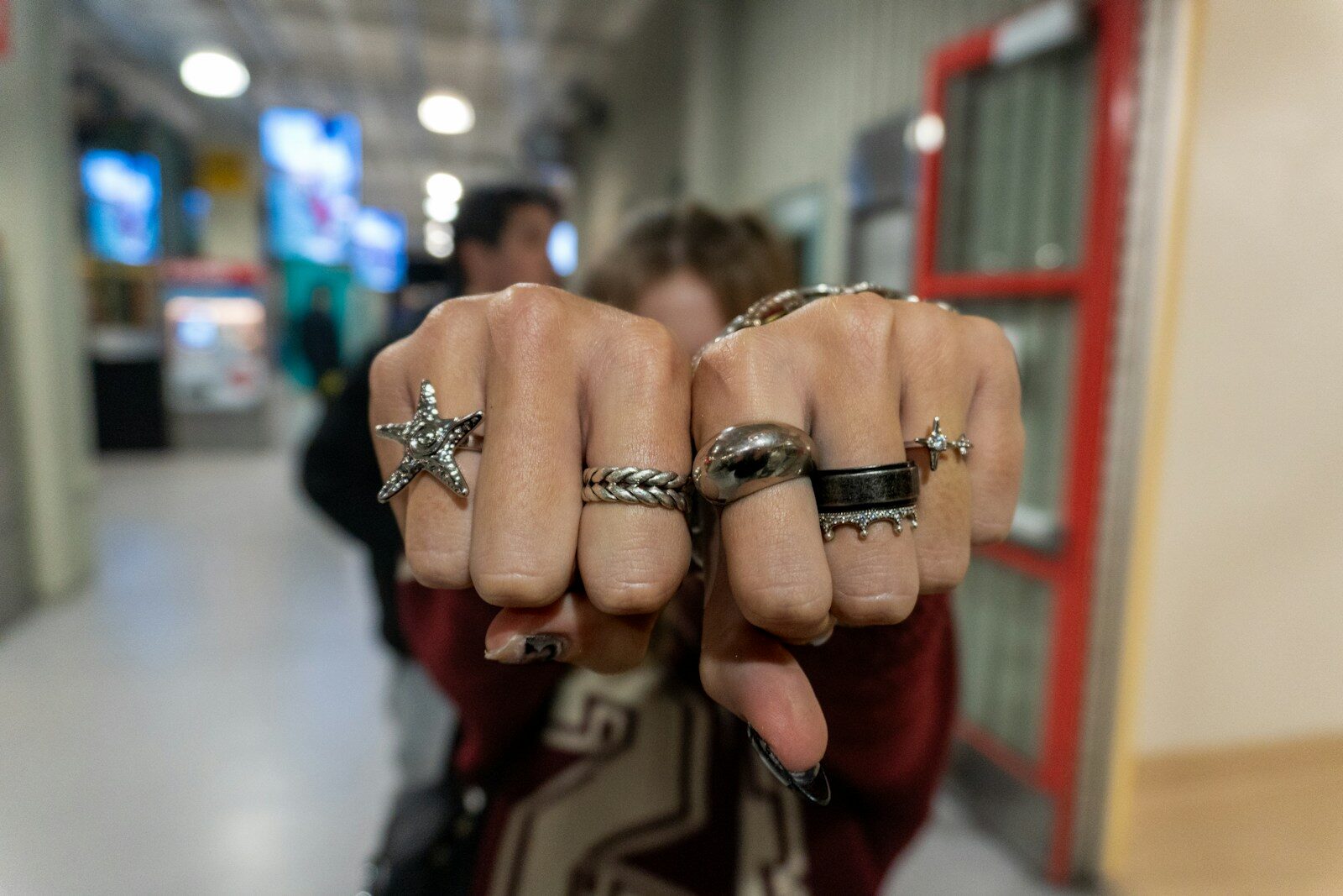 A person holding two fingers up in the air